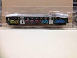 Liliput L387614 - Wagon voyageurs 2ème classe avec graffitis - SBB-CFF - HO