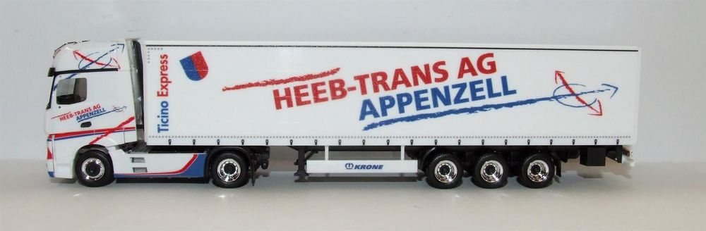 Herpa 917292 - Mercedes-Benz Actros Gigaspace semi-remorque à bâche à rideaux "Heeb" (Modèle spécial suisse) - 1/87