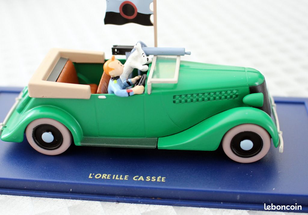 En voiture Tintin - La Mitrailleuse de "l'Oreille cassée (1940)" - (Occasion vérifiée)